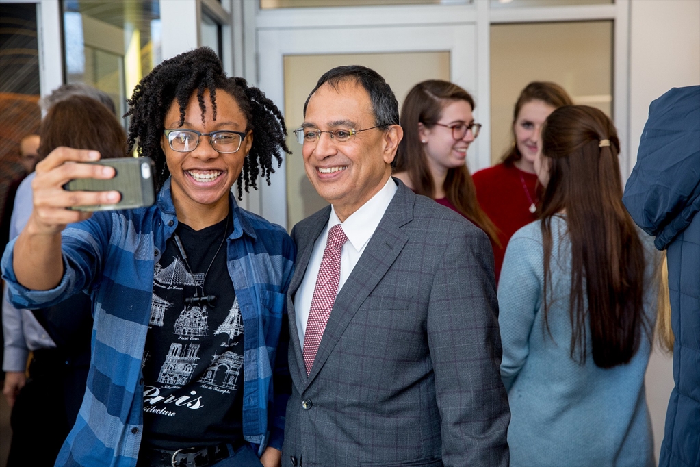 Chancellor taking a selfie with an alumna
