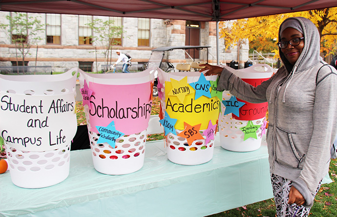 Student contributing to student scholarships