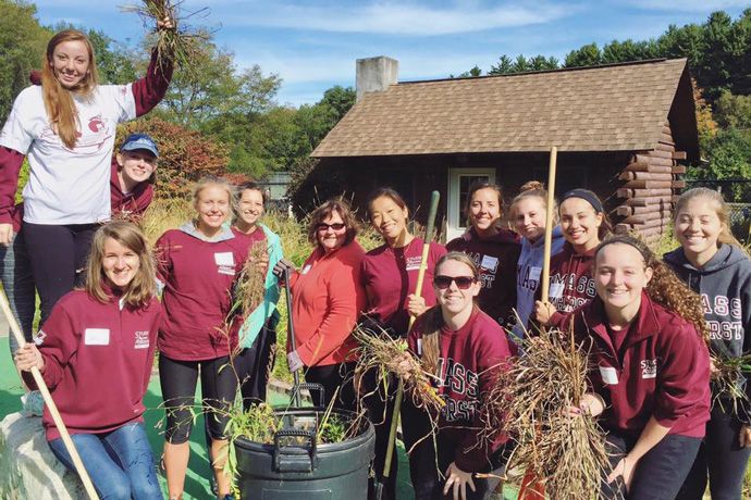 Students cleaning up a park